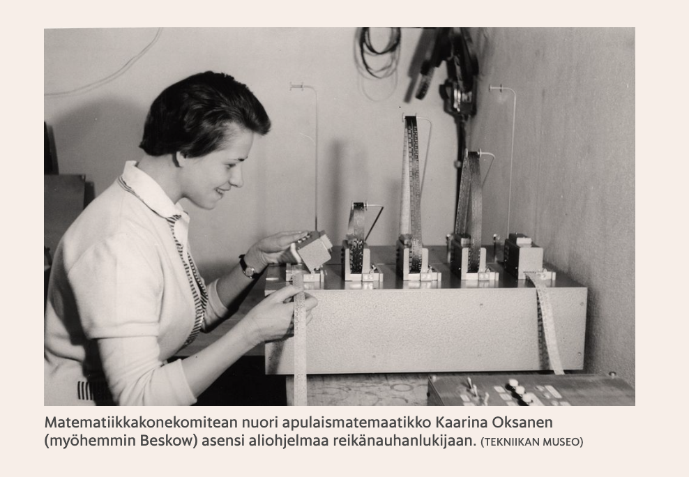Young mathematician Kaarina Oksanen (later Beskow) loading a program into a punched tape reader at the Mathematical Machine Committee